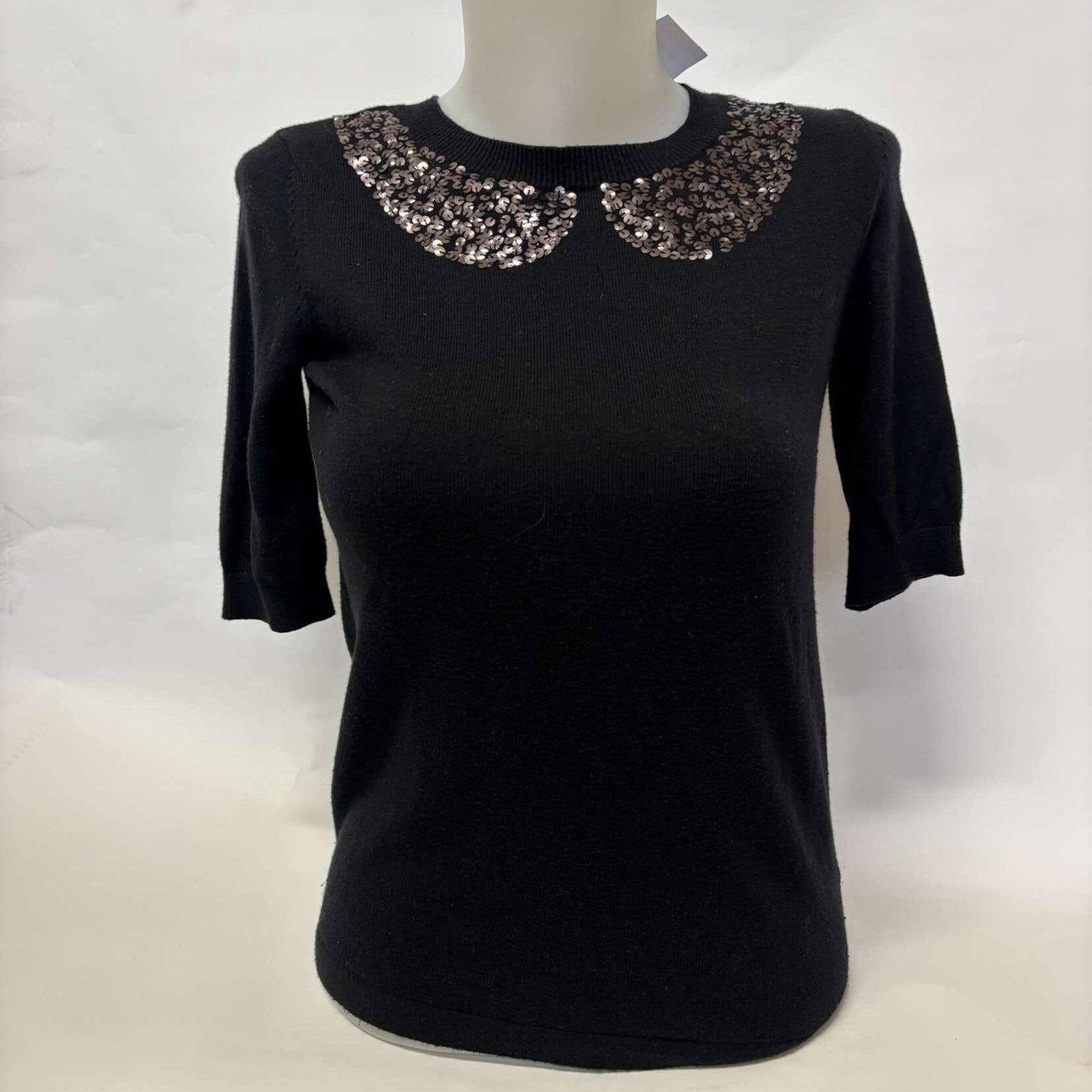 * Pull noir à paillettes taille S