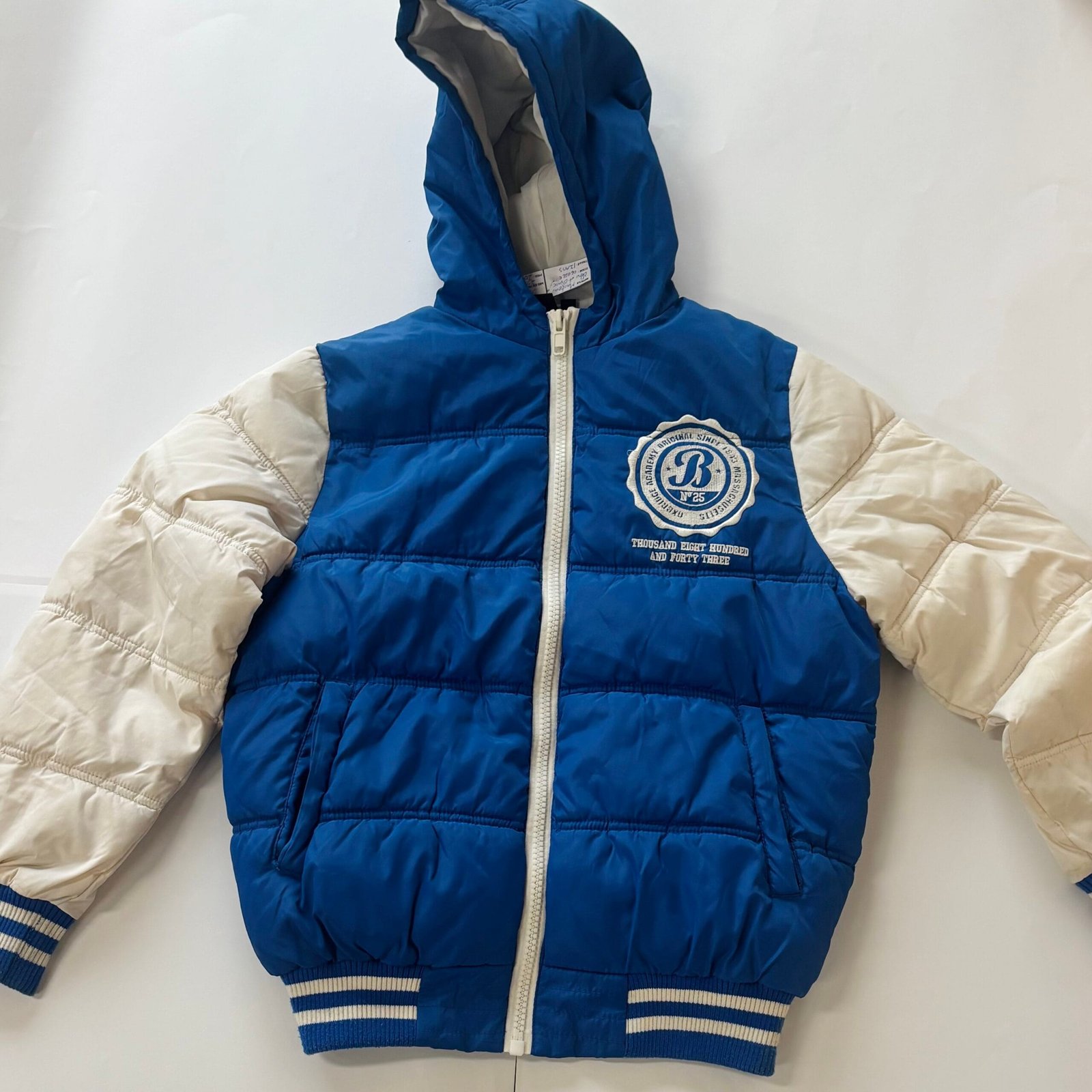 * Manteau bleu et blanc T12 ans